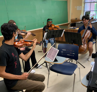 Pedro Maia with String students